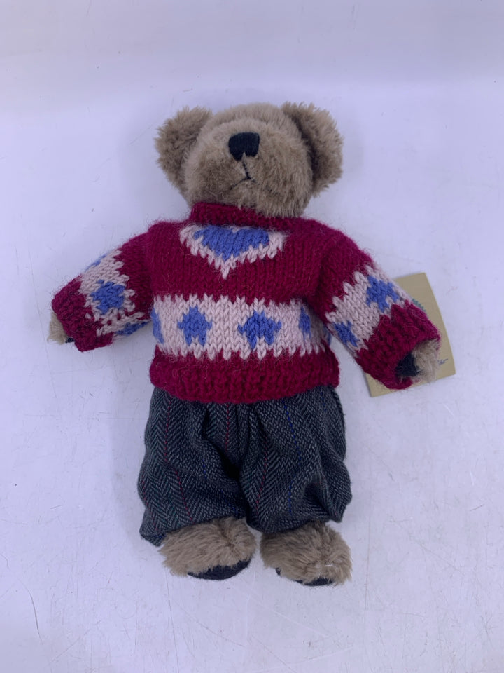 DARK GREY SHAG BEAR W/ MAROON SWEATER GREY PANTS.