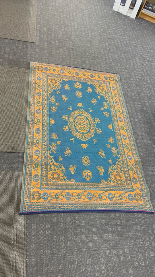 BLUE/ORANGE MAD MATS REVERSIBLE INDOOR OUTDOOR RUG.