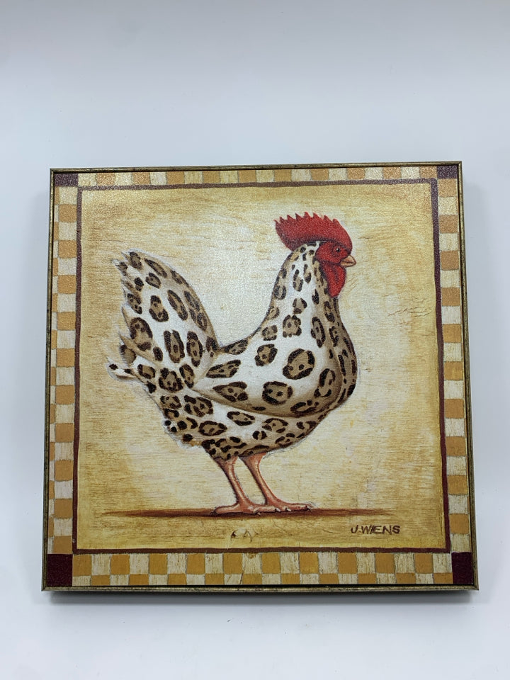 ROOSTER CANVAS IN BLACK PLASTIC FRAME.