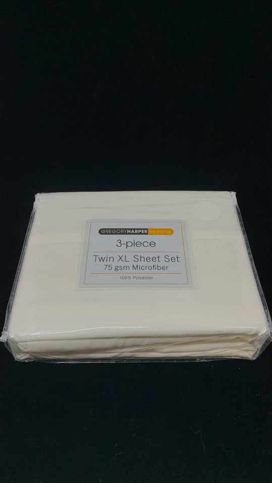 NIP TWIN XL CREAM SHEET SET.