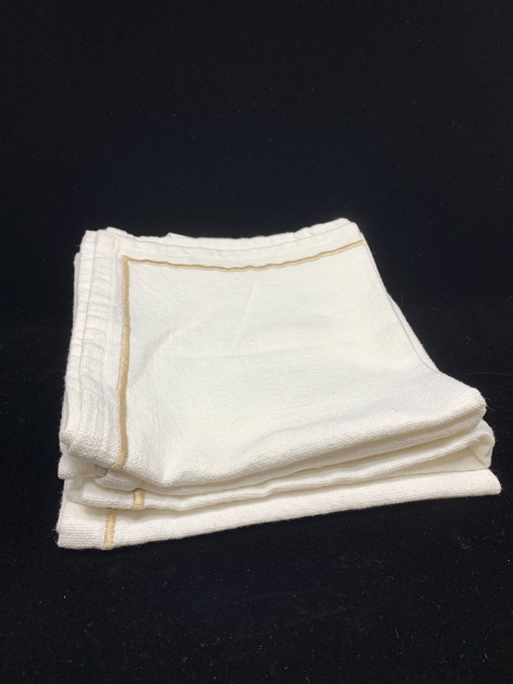 4 WHITE W/TAN EMBROIDERY NAPKINS.