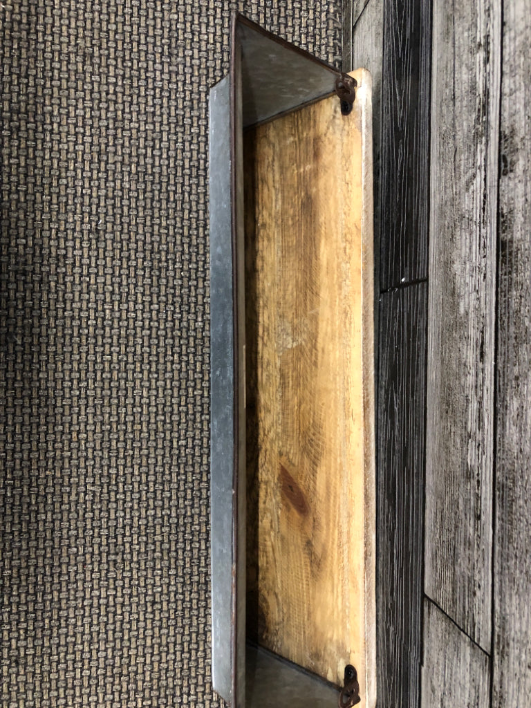 WOOD WALL SHELF WITH METAL BOTTOM ACCENT.