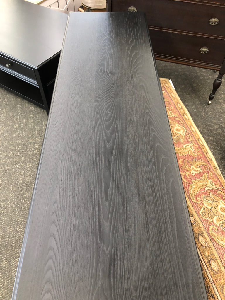 DARK WOOD TV CONSOLE W/2 SHELVES.