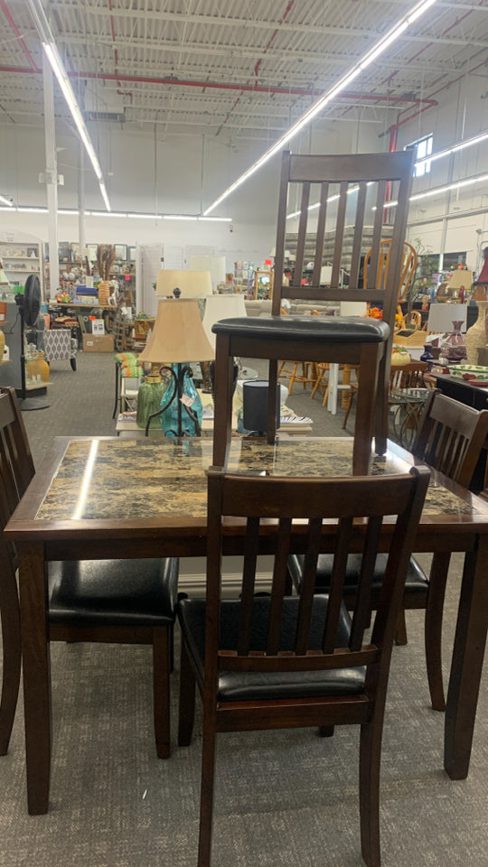 DARK WOOD DINING TABLE W/FAUX MARBLE TOP AND 4 DARK WOOD CHAIRS W/FAUX LEATHER S
