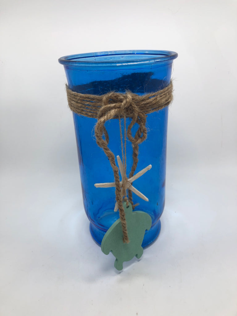 BLUE GLASS CANDLE VASE W/BURLAP AND TURTLE.
