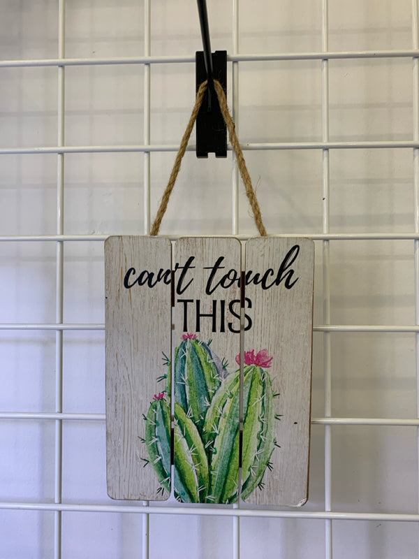 CAN'T TOUCH THIS CACTUS WALL HANGING.