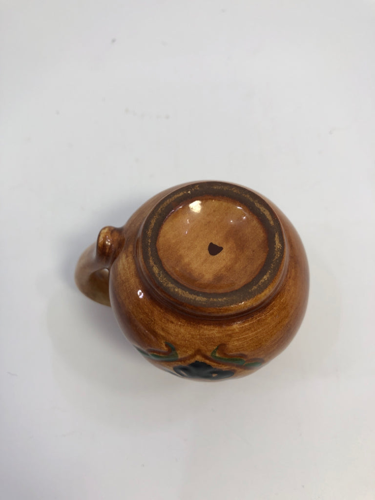 MINI BROWN PITCHER W/PAINTED WOMAN.
