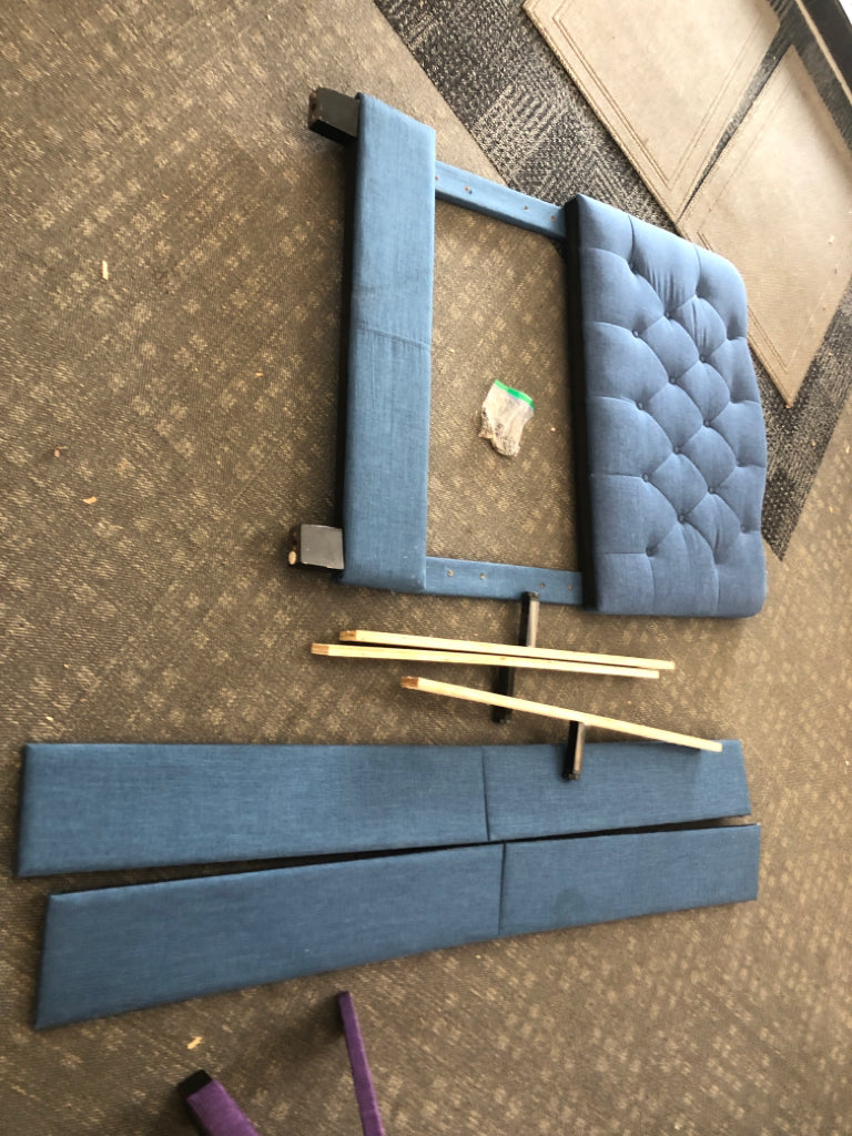 NAVY TWIN UPHOLSTERED FABRIC BED.