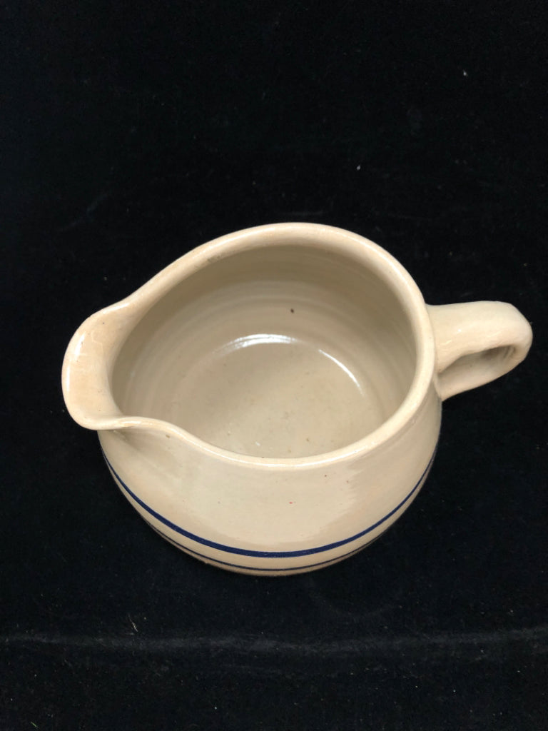 BLUE STRIPED POTTERY PITCHER.