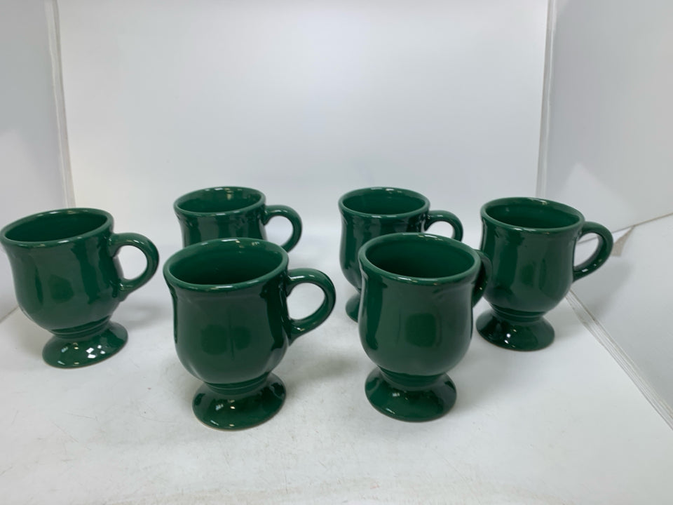 6 DARK GREEN FOOTED MUGS.
