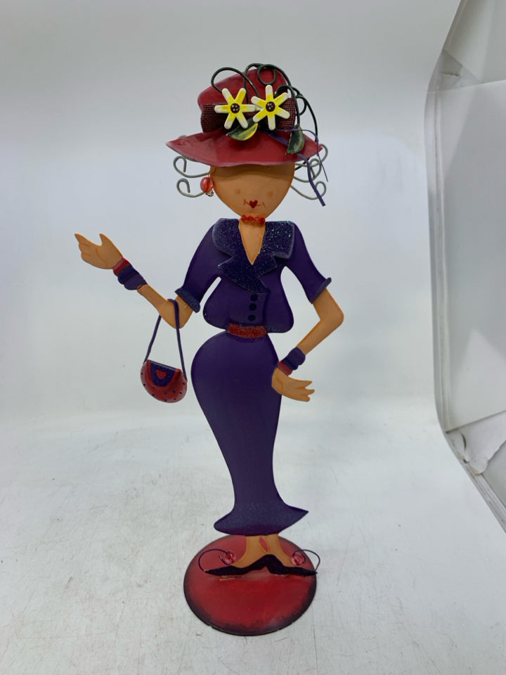 METAL STANDING WOMAN W/ PURPLE DRESS, SHOES SPARKLE COLLAR.