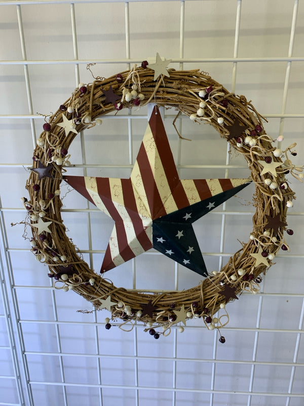 PRIMITIVE PIP AND STARS TWIG WREATH WITH FLAG STAR CENTER.