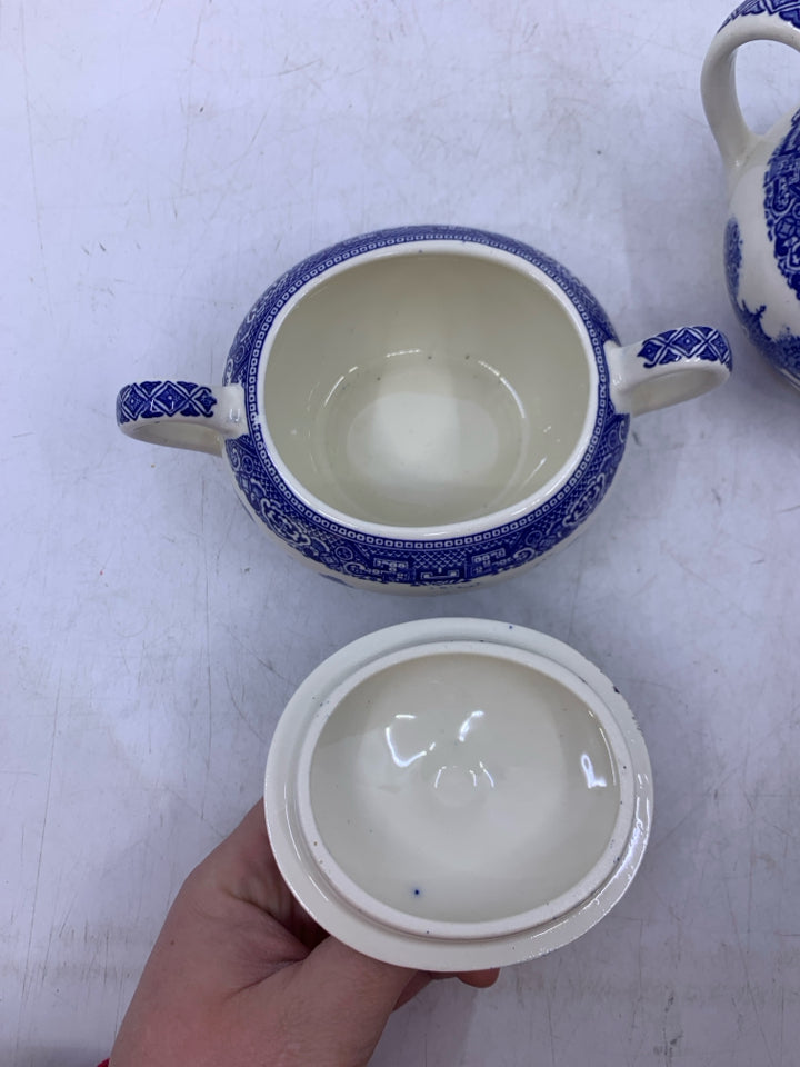 WHITE W/ BLUE ASIAN STYLE SCENE.