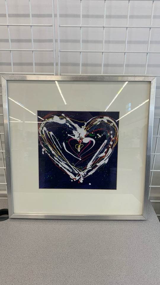 BLUE SPLATTER PAINT HEART IN SILVER FRAME.