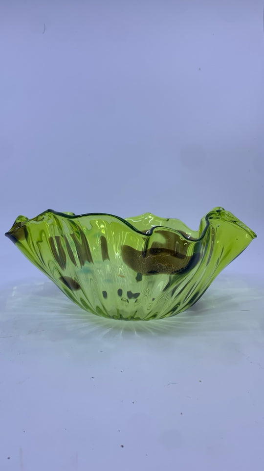 BLOWN LIGHT GREEN GLASS BOWL W/ DARK BROWN SPOTS UNEVEN EDGE.