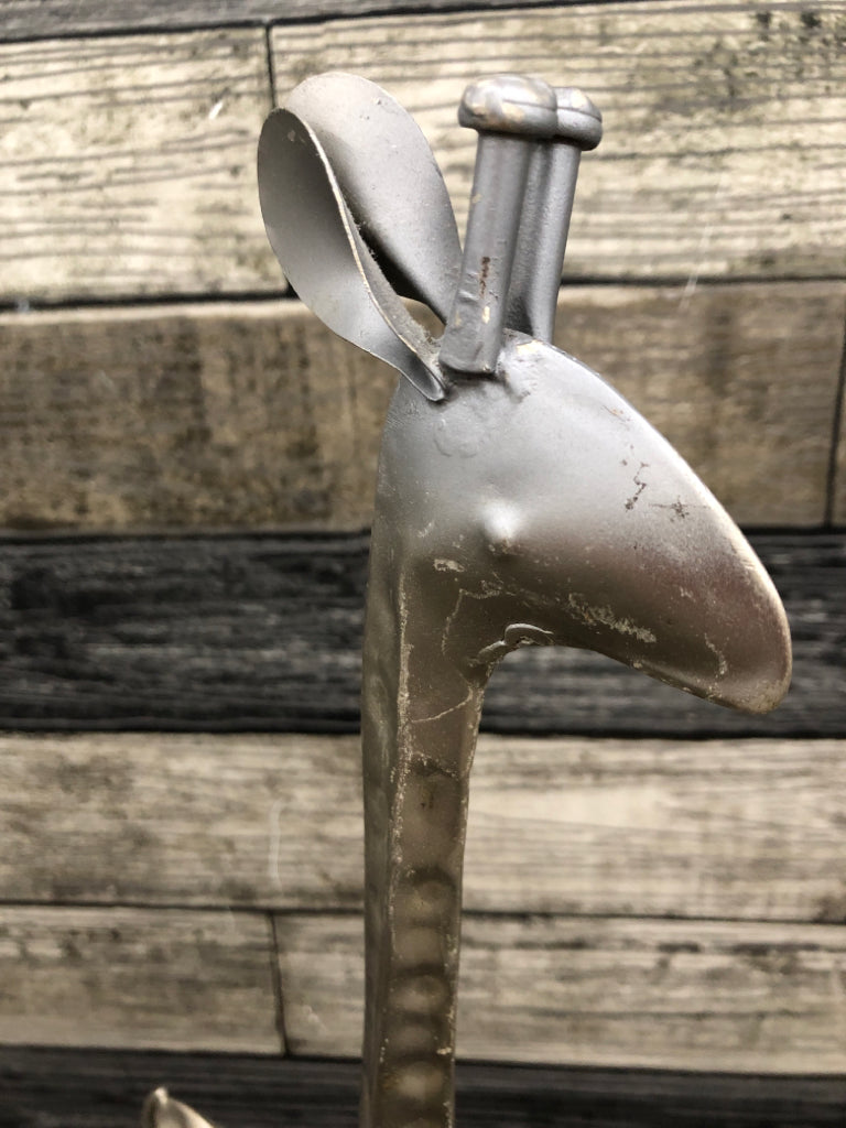 LONG-LEGGED METAL GIRAFFE FIGURINE.