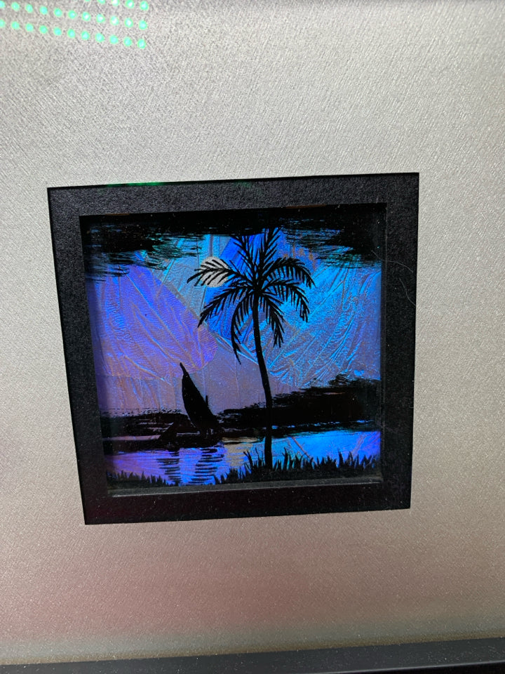 SHADOW BOX FRAME W/ PALM TREE/BOAT SCENE.