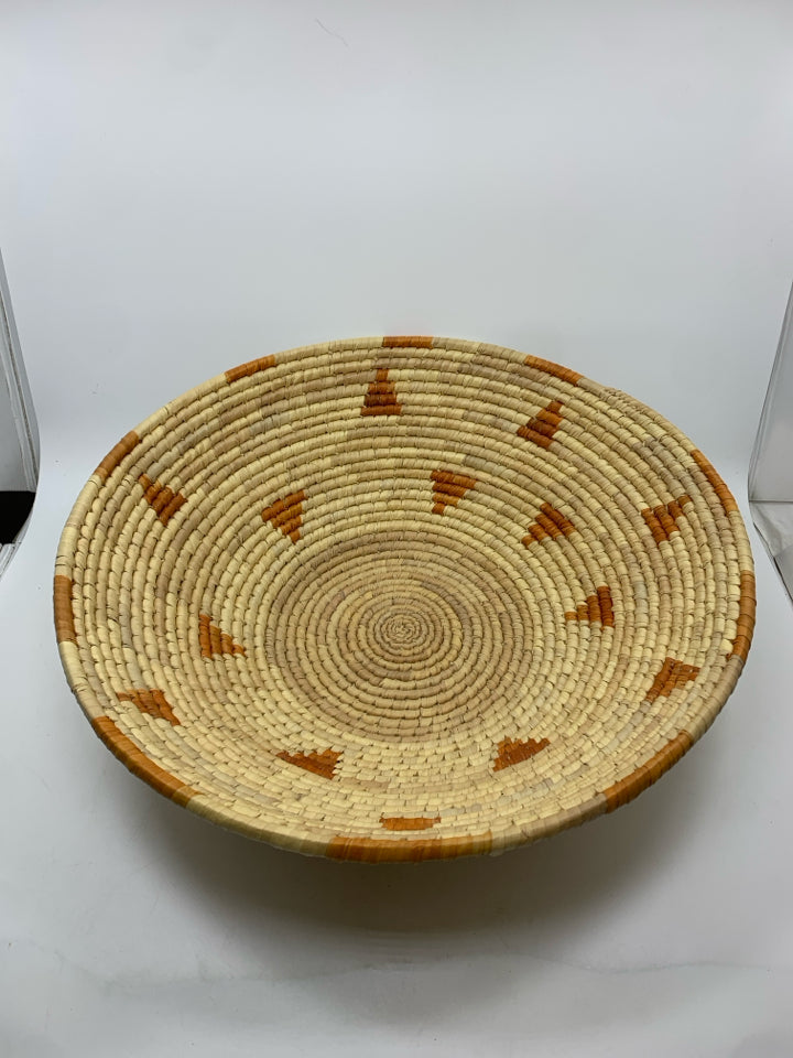 WOVEN BOWL W/ORANGE ACCENTS.