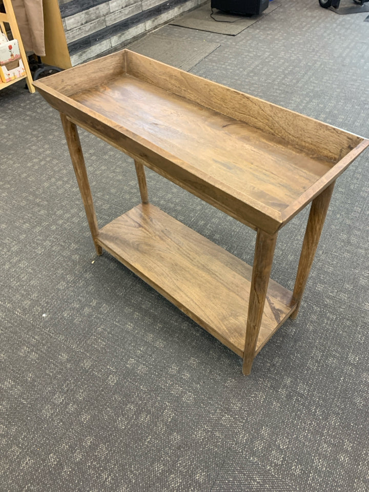 BROWN DISTRESSED WOOD TRAY TABLE.