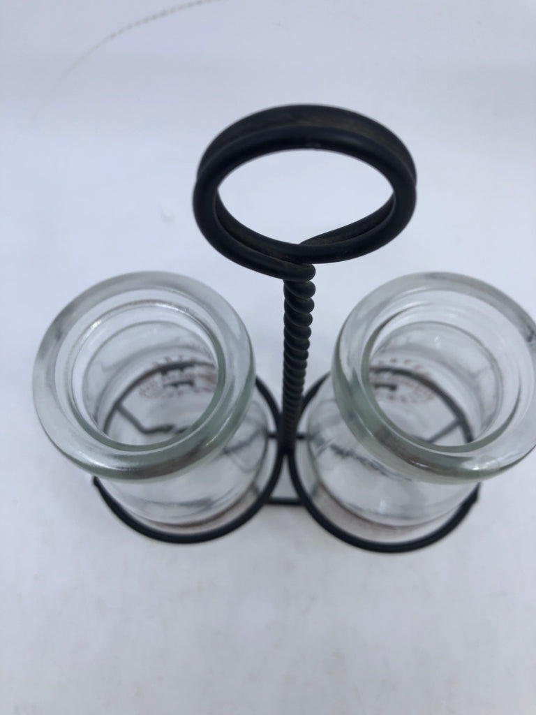 3PC DAIRY GLASS BOTTLES IN METAL HOLDER.