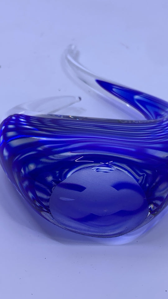 BLUE GLASS SWIRL SHELF DECOR.