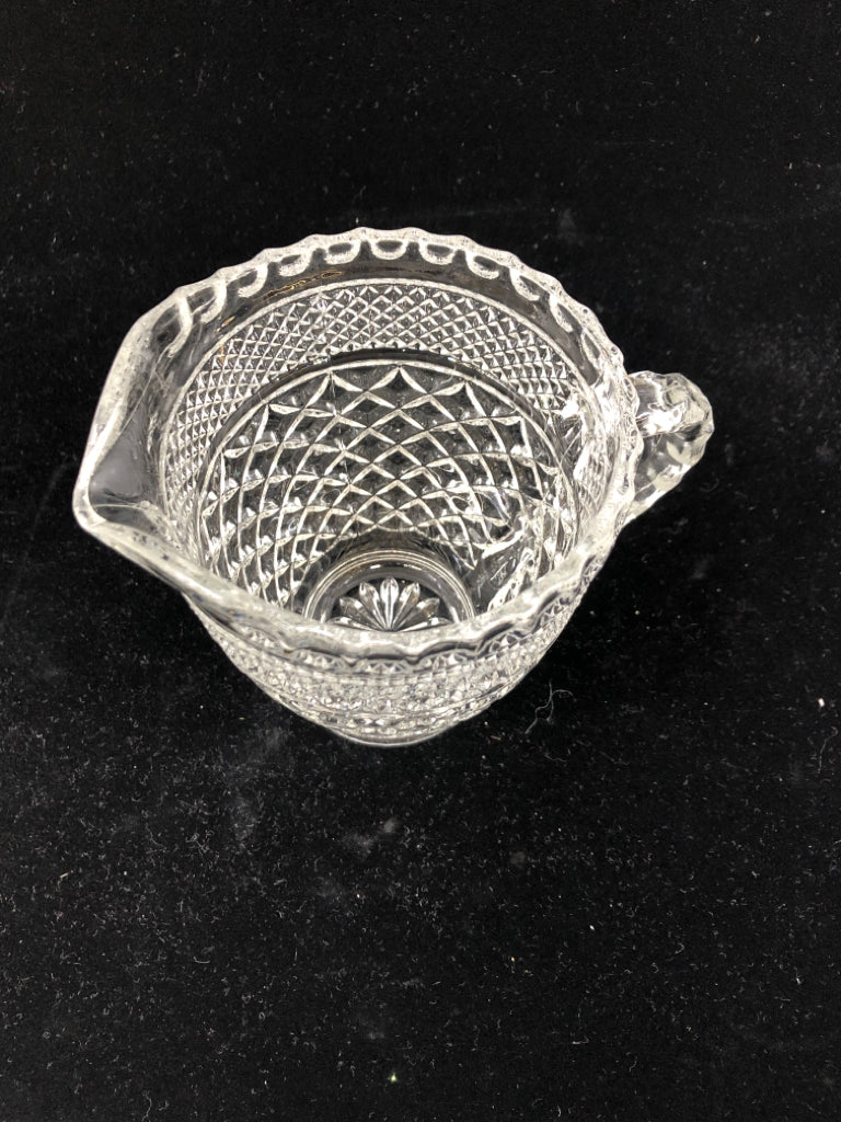 SMALL CLEAR CUT GLASS PITCHER.