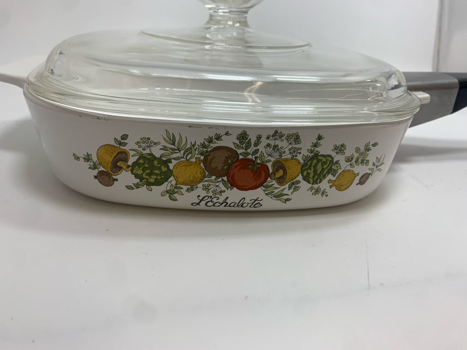 SPICE OF LIFE CASSEROLE DISH W/LID AND LOCKING HANDLE.