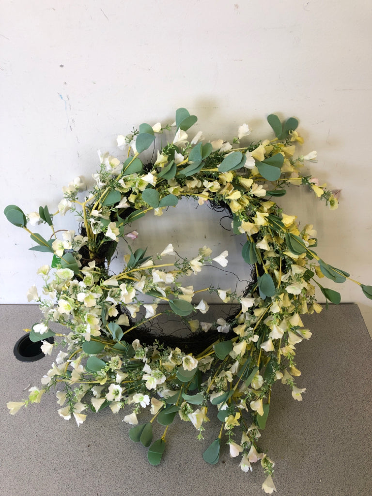 WHITE SMALL FLOWERS W/ GREEN LEAVES WREATH.