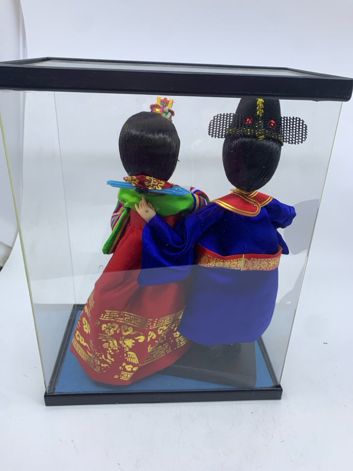 2 ASIAN STYLE DOLLS IN CASE.