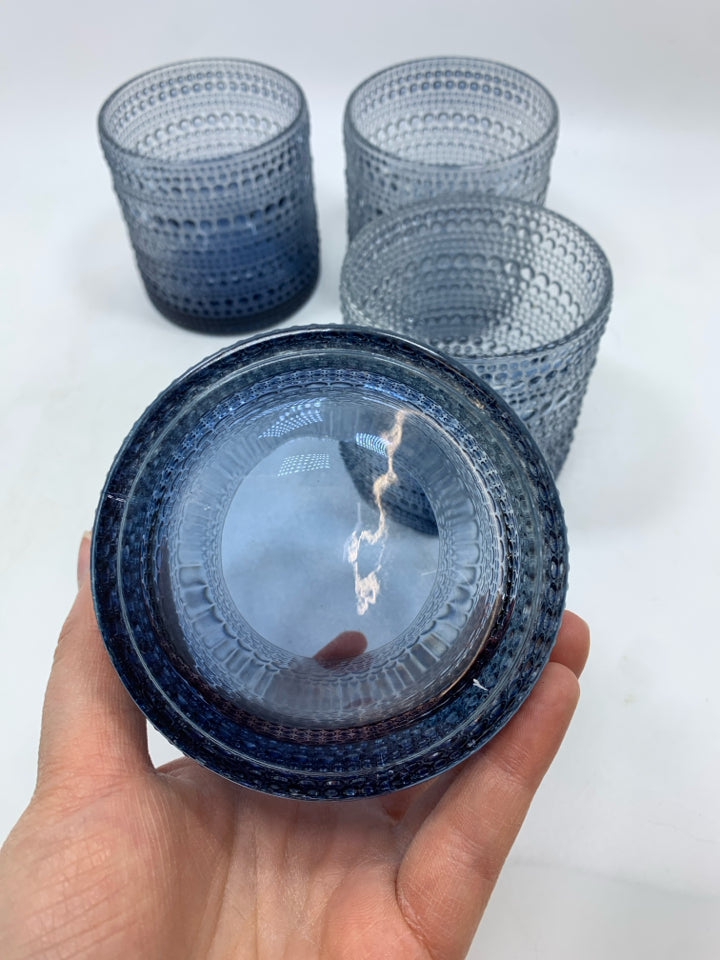 4 TEXTURED BLUE GLASS TUMBLERS.