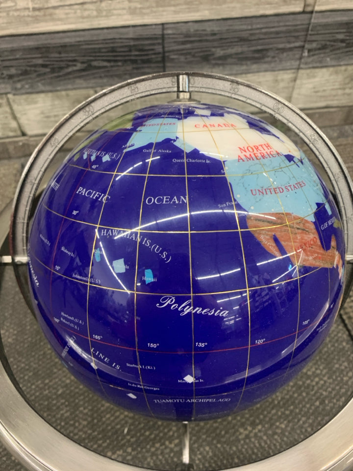 GLOBE WITH DIFFERENT STONE COUNTRIES.