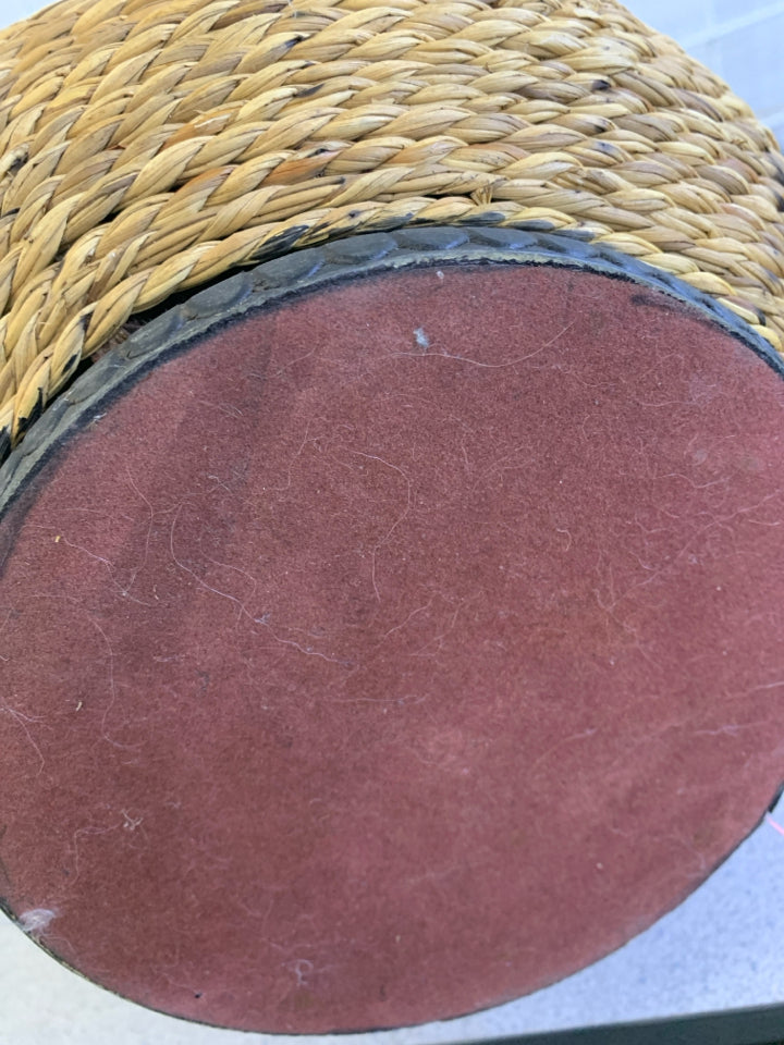 WOVEN RATTAN CANDLE HOLDER.