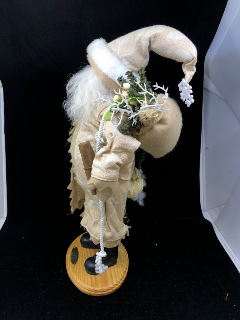 SANTA IN CREAM COAT.