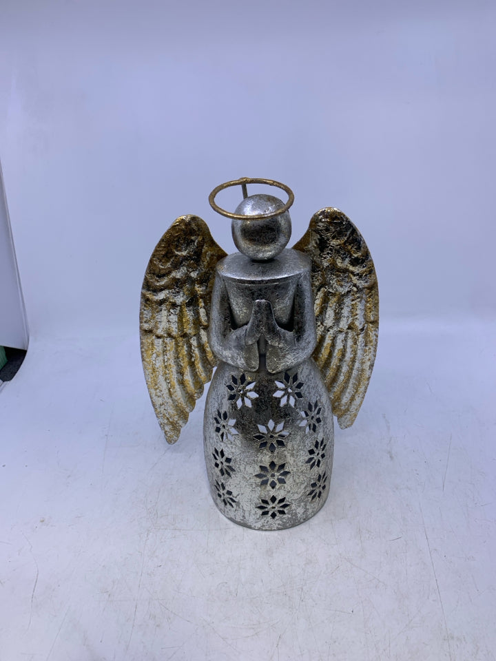 PIERCED ANGEL TEA LIGHT HOLDER.