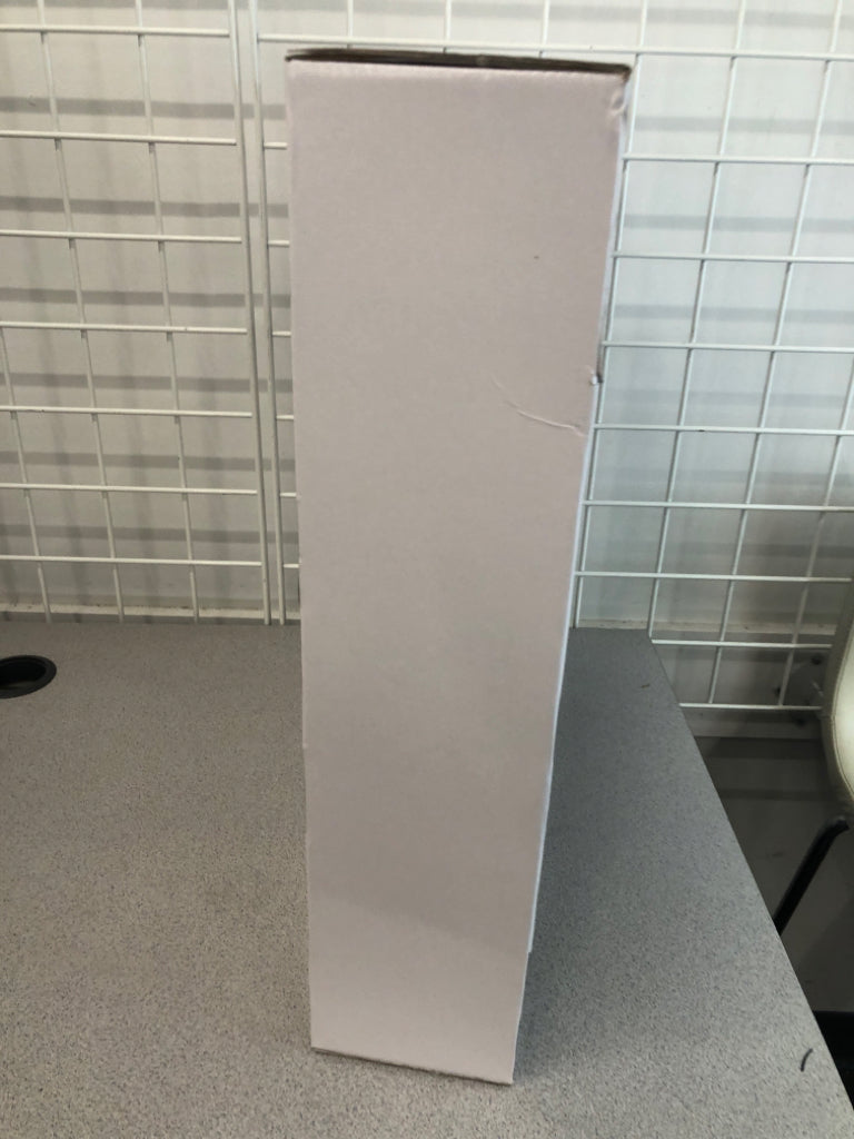 NIB 2 WAVY WALL SHELVES.