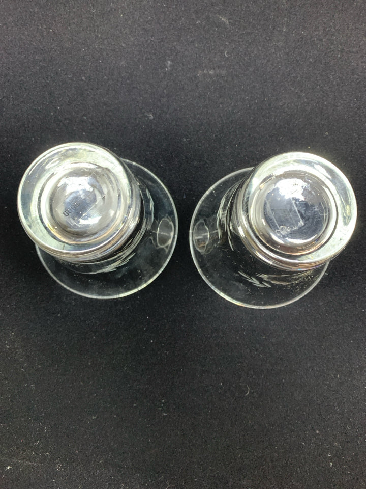 2 GLASS ETCHED CANDLE HOLDERS.