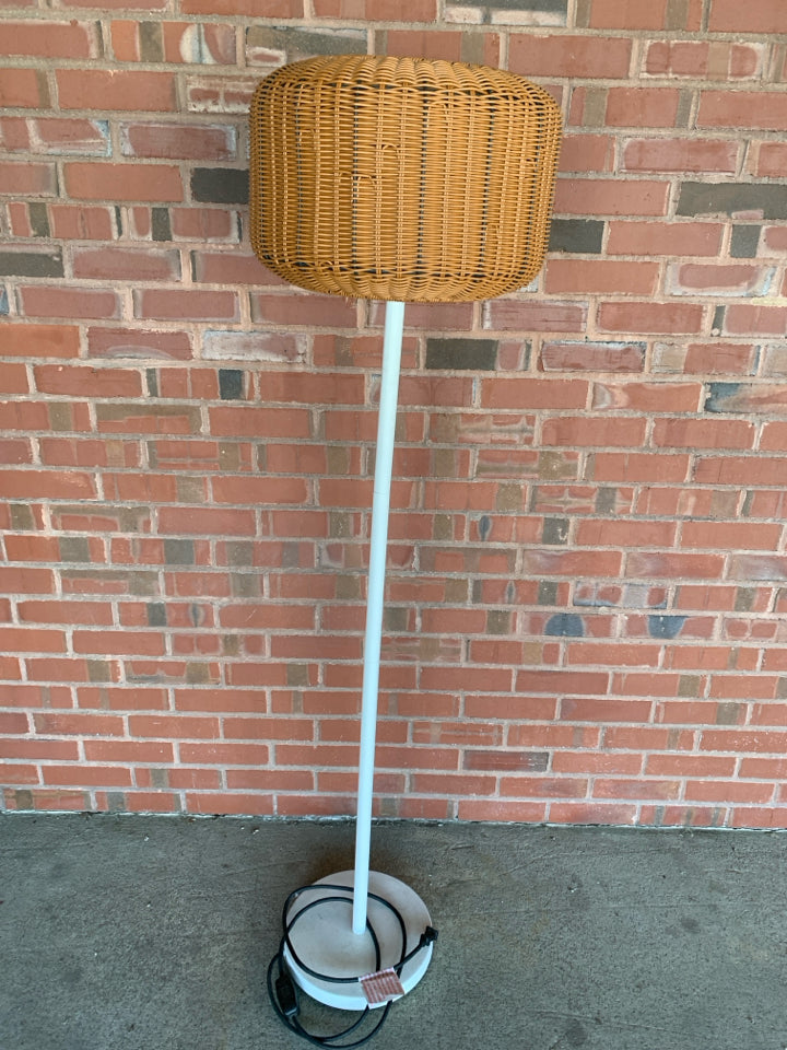 TALL BROWN WICKER BASKET WEAVE FLOOR LAMP.