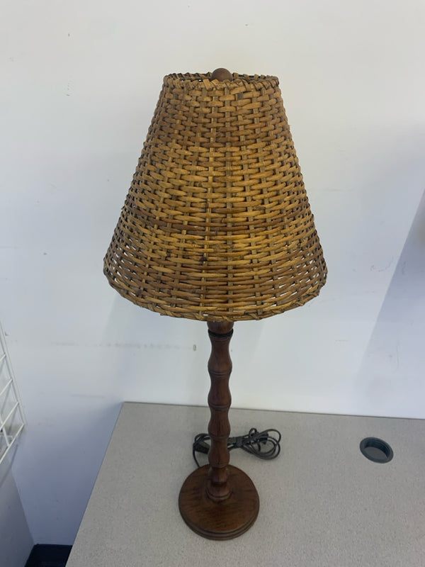 BROWN DISTRESSED PALM TREE LAMP WITH WICKER SHADE.