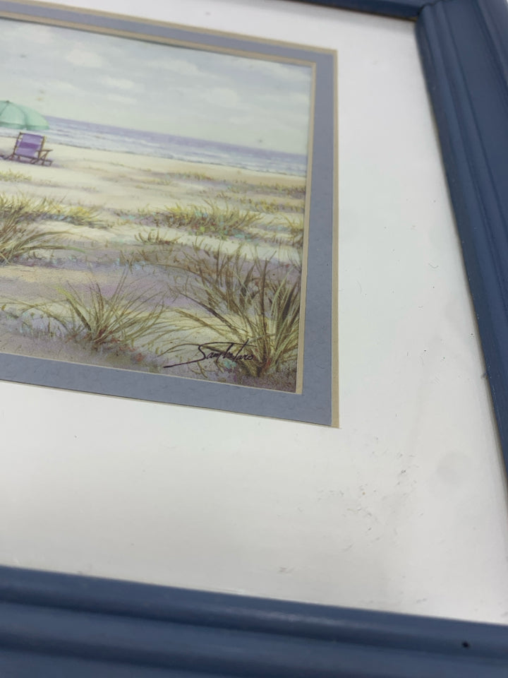 BEACH CHAIRS AT OCEAN PRINT IN BLUE FRAME.