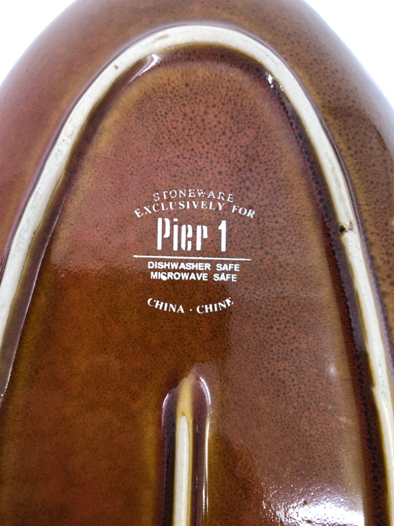 2 BROWN OVAL CERAMIC SERVING PLATES.
