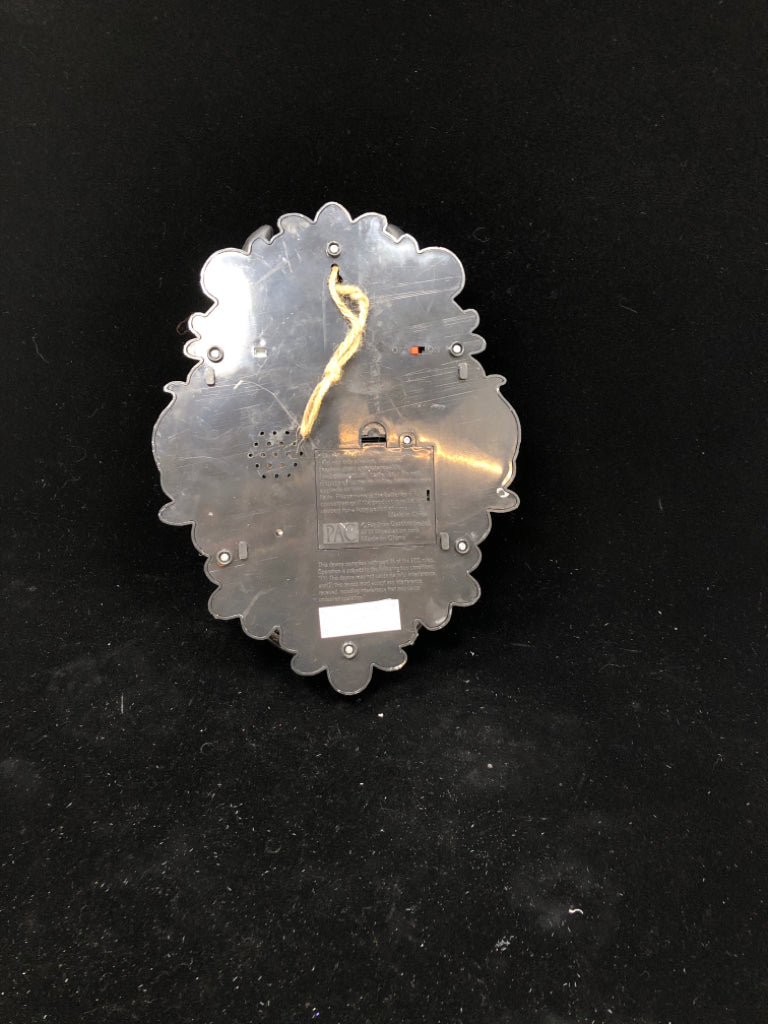 TALKING DRAGON HEAD DOOR KNOCKER W/LIGHT UP EYES.