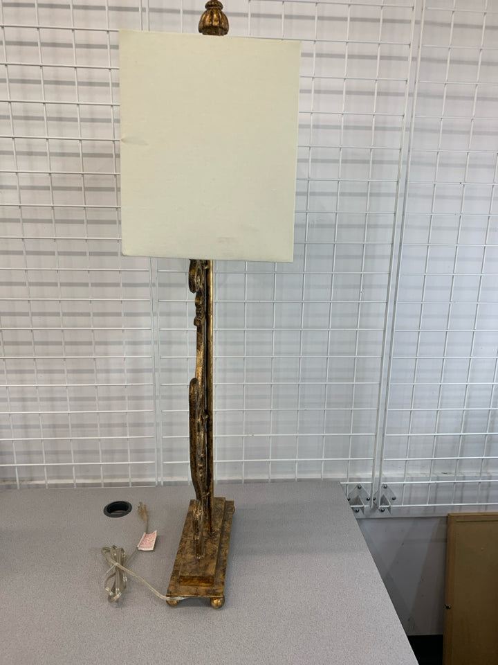 GOLD SCROLL METAL BASE LAMP W/SQUARE WHITE SHADE.