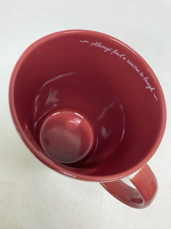 WHITE MUG W/ MONOGRAM J MAROON INSIDE.