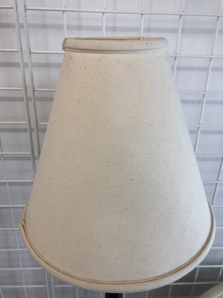 TALL BLACK LAMP W/CREAM FABRIC SHADE.