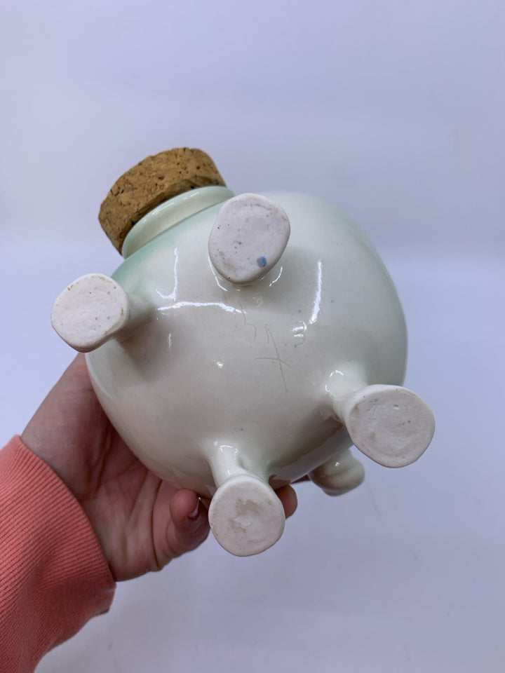 MINT GREEN POTTERY PIGGY BANK W/ CORK NOSE/ FROG LICKING EAR.