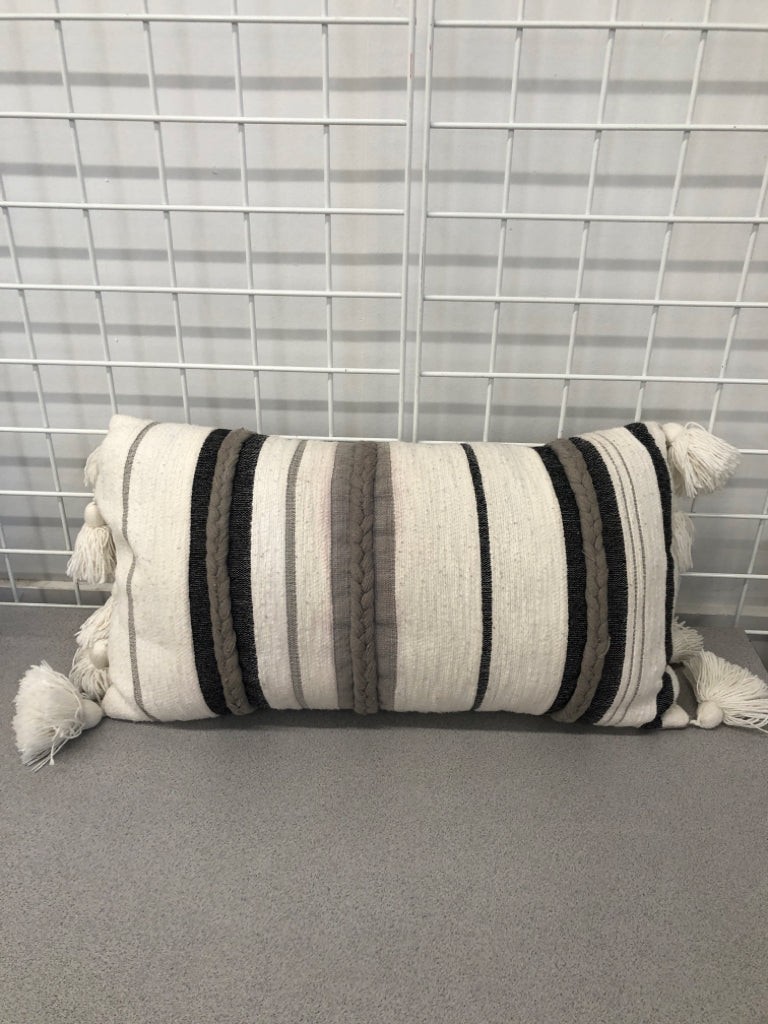 GREY STRIPE PILLOW W/TASSLES AND BRAID DETAIL.