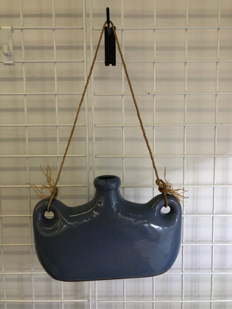 HANGING BLUE CRACKLE GLAZE POTTERY JUG.