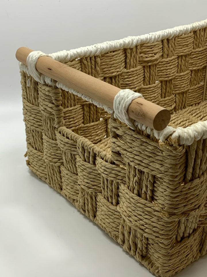 WOVEN BASKET W/DOWEL HANDLES AND WHITE EDGE.