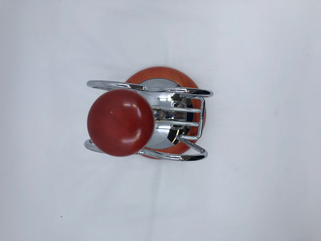 METAL WOOD SPINNING NAPKIN HOLDER.