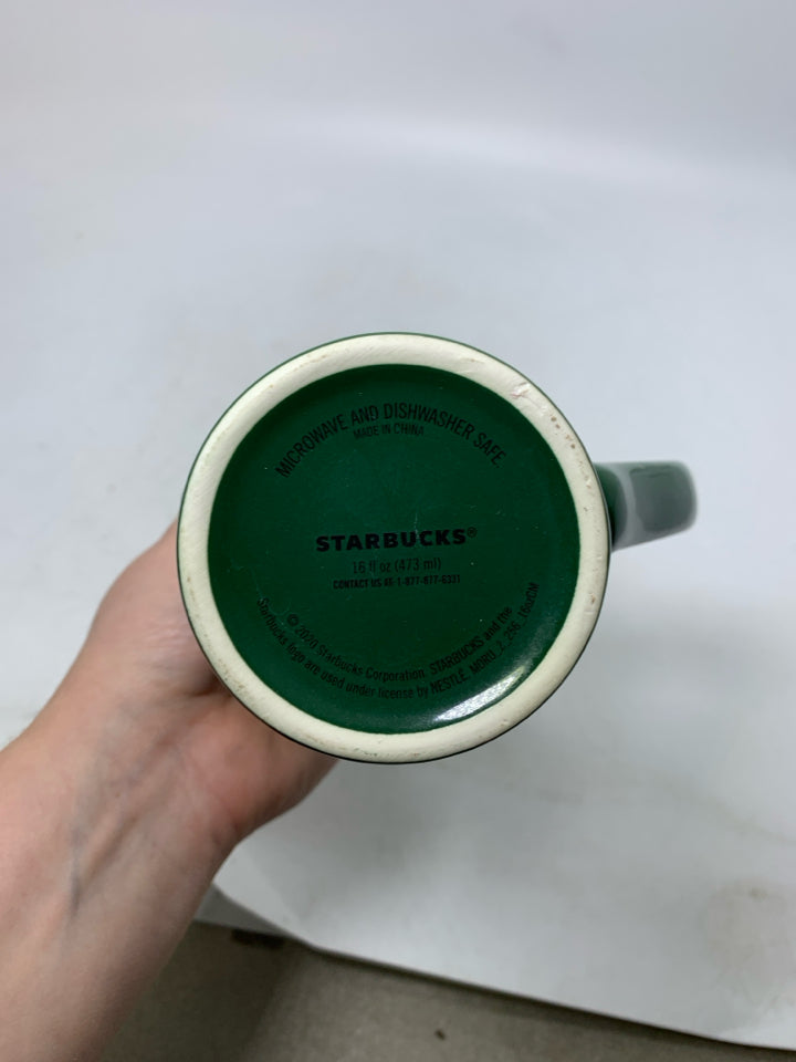 GREEN STARBUCKS MUG W/ PURPLE TREES.